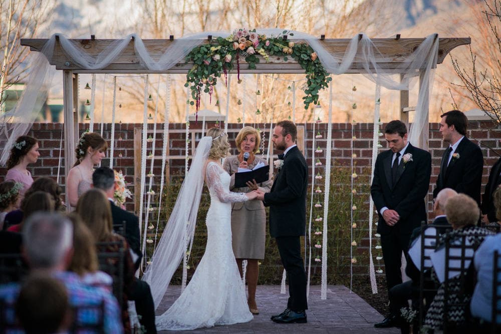 Close-up of hands with engagement ring