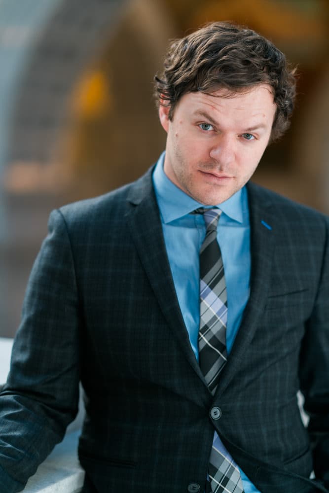 Couple laughing together in an elegant hallway