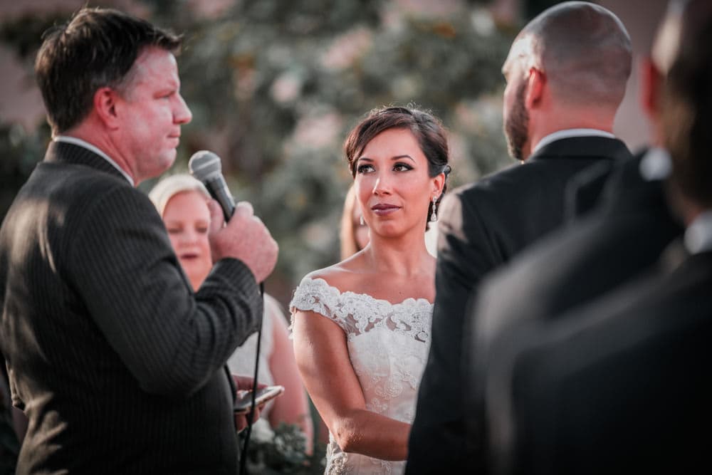 Bride listening during vows